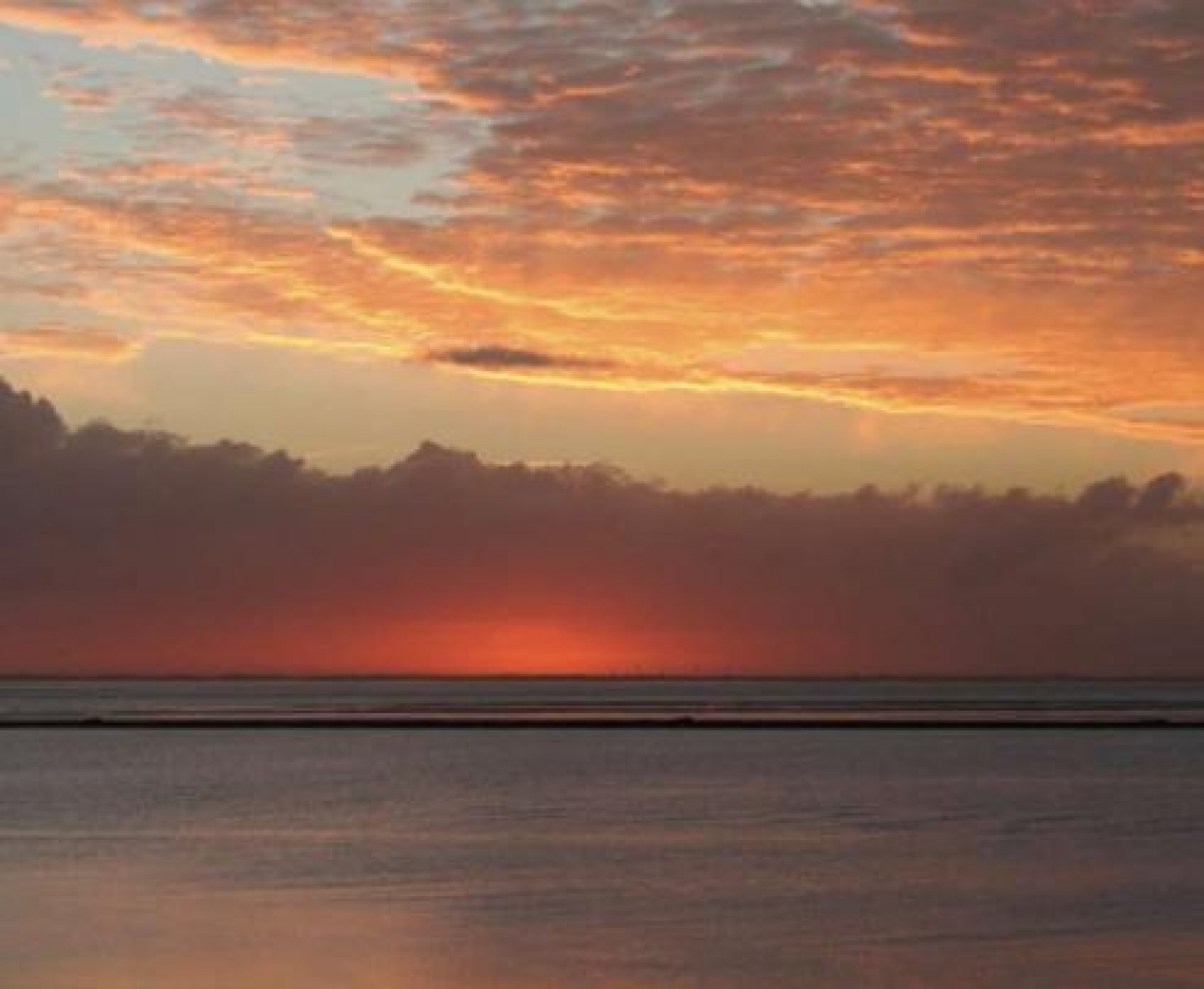 Foto zonsondergang Waddenzeegebied